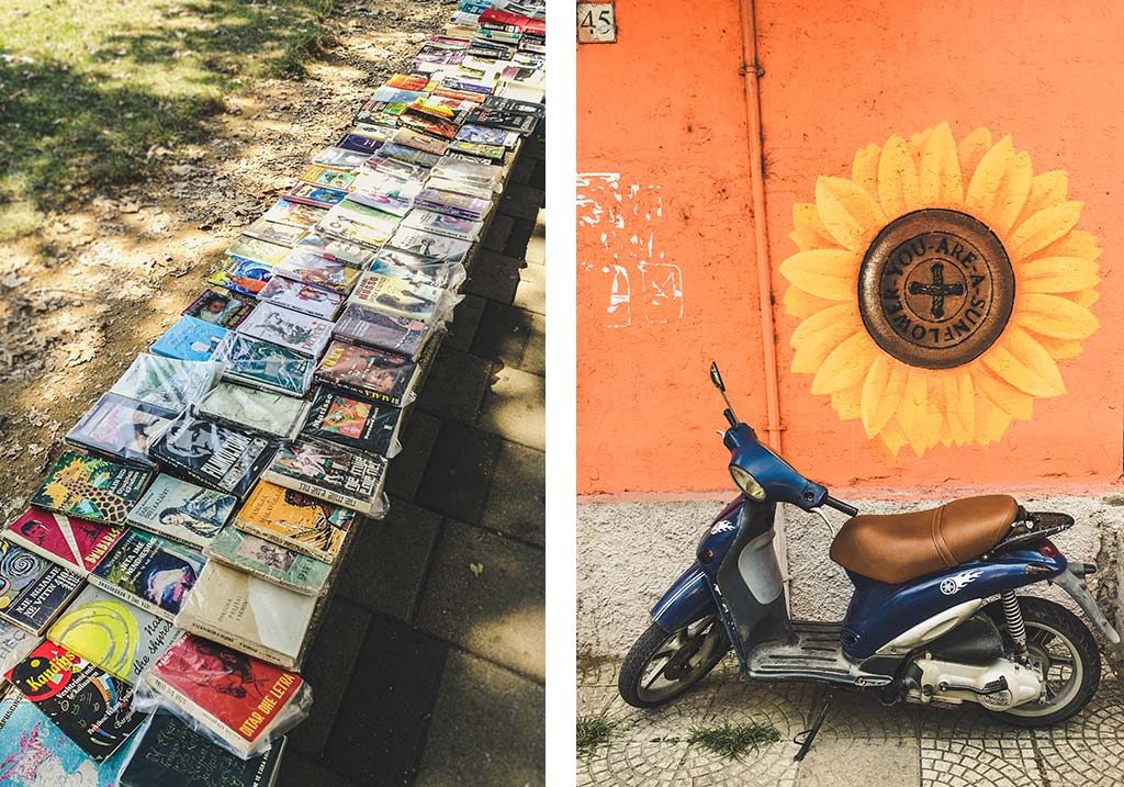 książki na murku i skuter na tle graffiti